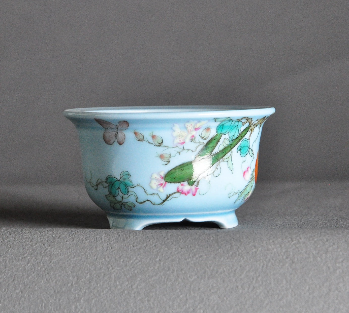 Overglaze pastel melon and butterfly hand-painted round pot