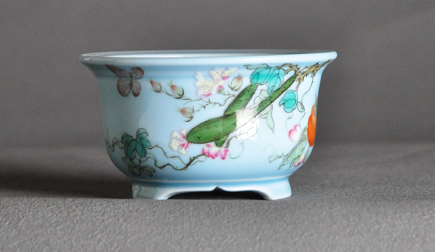 Overglaze pastel melon and butterfly hand-painted round pot